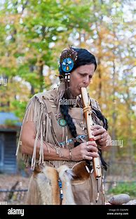 Image result for A Girl Playing Indian Flute