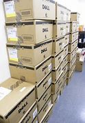 Image result for Stacks of Dell Laptops in Boxes