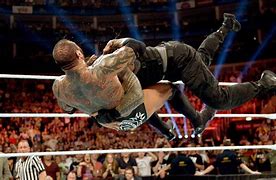 Image result for WWE Roman Reigns Spear