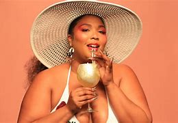 Image result for Singer Who Plays Flute Lizzo