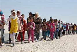 Image result for Pictures of Refugees Fleeing