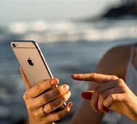 Image result for Person Holding Out an iPhone