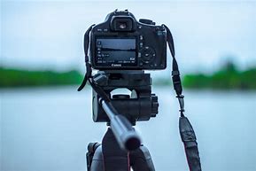 Image result for iPhone Camera Case with Tripod