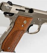 Image result for S and W Semi Auto Pistol 9Mm