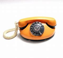 Image result for Telephone Gold Colour
