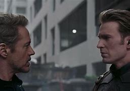 Image result for Captain America and Tony Stark Hand Shake Wallpaper