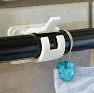 Image result for Adhesive Curtain Rod Hangers