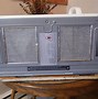 Image result for GE Spacemaker XL JVM 1320Bb001 Over the Range Microwave
