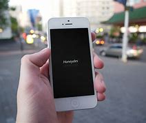 Image result for iPhone 5S in Hand Size