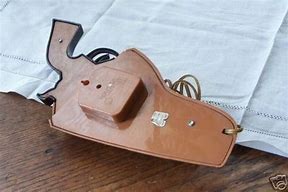 Image result for Spartus Gun in Holster Clock