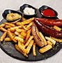 Image result for Hanging Sausage in a Traeger Smoker