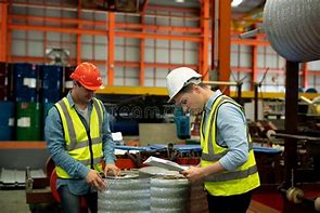 Image result for Two Men Working in a Factory