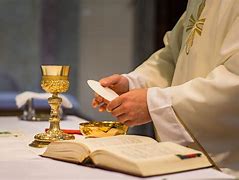 Image result for Priest Breaking Bread