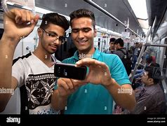 Image result for Young Man Phone Matro