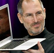 Image result for Steve Jobs Holding Apple
