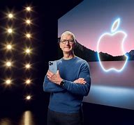 Image result for Tim Cook Holding iPhone