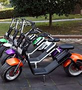 Image result for Battery Scooters for Adults