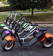 Image result for Battery Powered Scooters for Adults