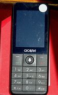 Image result for Alcatel Flip Phone Silver