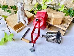 Image result for Cast Iron Cheese Grater