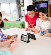 Image result for People Playing Nintendo Switch