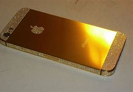 Image result for Chrchris Brown iPhone 5S Gold