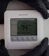 Image result for Honeywell Thermostat Battery Change