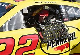 Image result for Joey Logano Wearing a NASCAR Hat