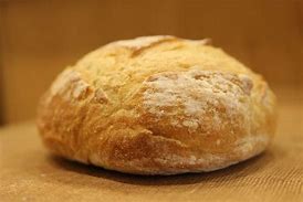 Image result for Cooking Bread On Top of Soup Kettle Lid