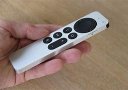 Image result for Holding New Apple TV Remote