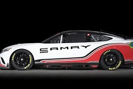 Image result for NASCAR with Wheels On Side