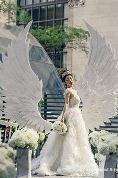 Magnificent Angels Wings created by Engineered Arts for the Wedluxe Magazine  #sculpture#3dfoam#3d#tor… | Wedding decorations centerpieces, Wedding, Wedding dresses