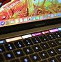 Image result for MacBook Pro Touch Bar 2022