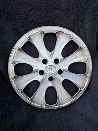 Image result for Toyota Corolla Black Hubcaps