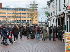Image result for People Lining Up at a Coffee Shop