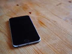 Image result for iPhone 6 On Table