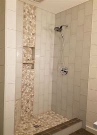 Image result for Brown Shower Tile with Pebble Waterfall