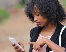 Image result for Person On a Mobile Phone