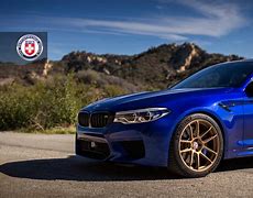 Image result for Blue BMW with Gold Wheels