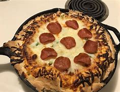 Image result for Baking Pizza in Cast Iron Pan