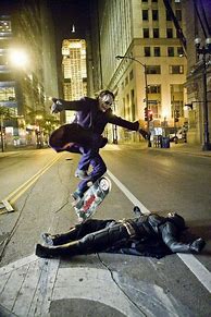 Image result for Joker Skateboarding Over Batman