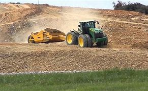 Image result for Tractor Moving Dirt