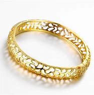 Image result for Solid 24K Gold Rounded Bangle