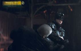 Image result for Batman Fighting Criminals