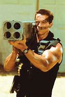 Image result for Arnold Schwarzenegger Machine Gun