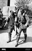 Image result for German Soldiers Carrying Another