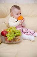 Image result for Little Girl Eating Fruit