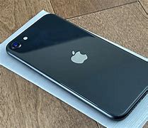 Image result for iPhone SE 2nd Gen in Someone's Hand