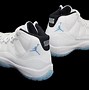 Image result for Jordan 11 Blue and Black and White