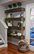Image result for Stone Wall in Living Room with Floating Shelves